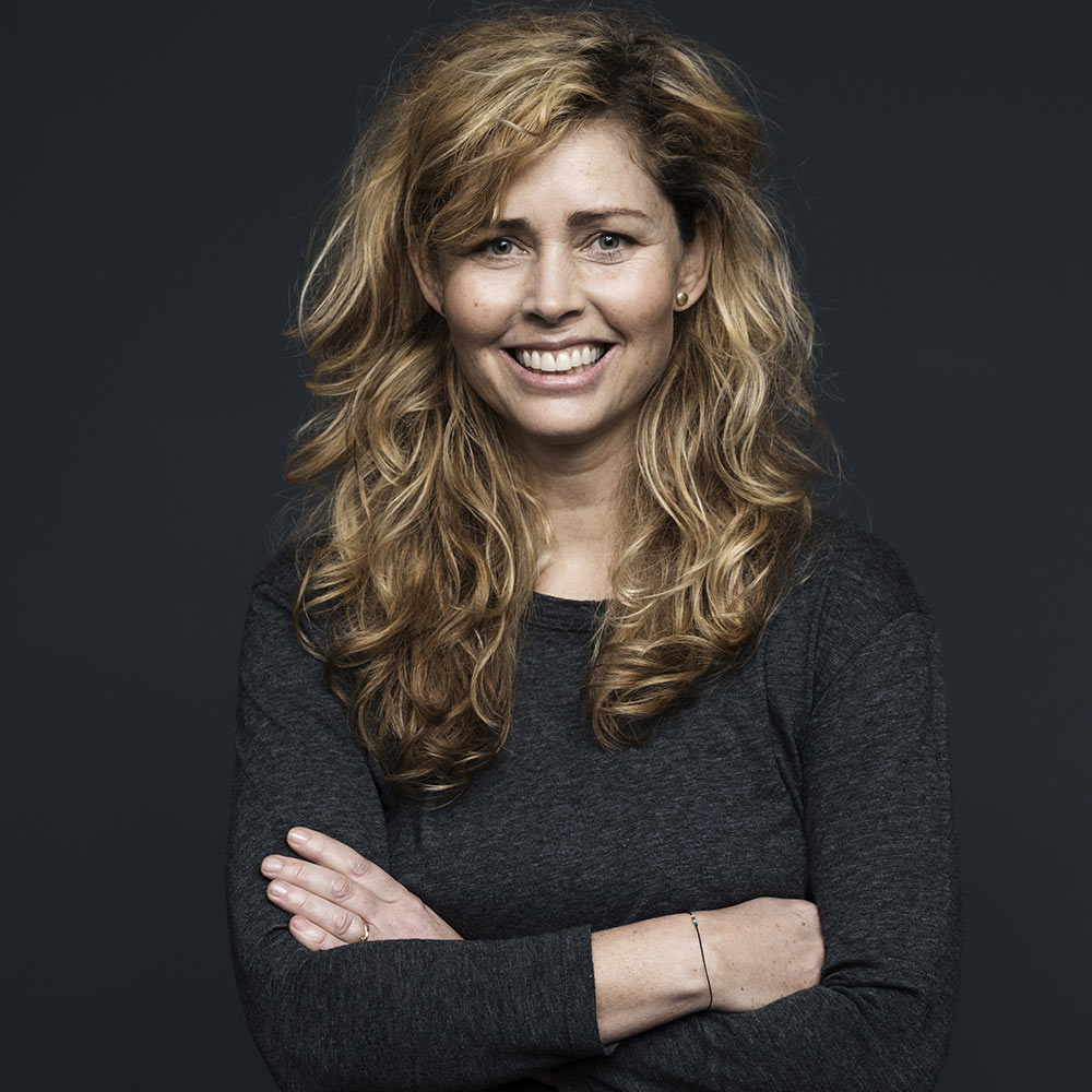 portrait of a woman smiling after completing virtual training