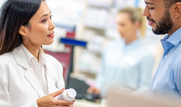 nurse and patient discussing a prescription medication