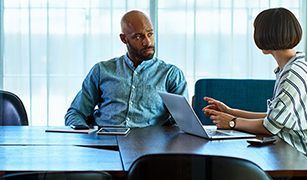 a man and woman having a serious conversation