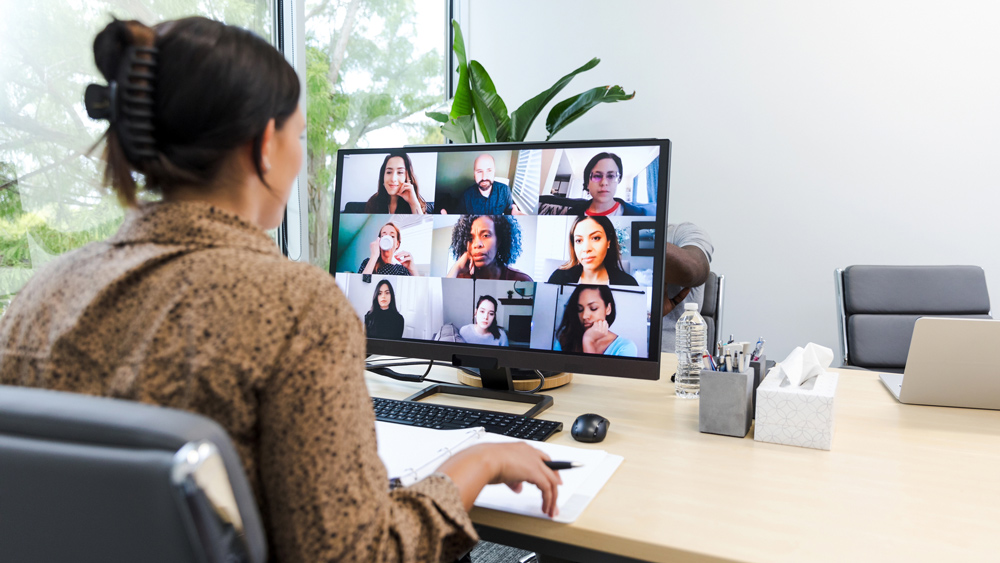 business woman leading a group virtual training session