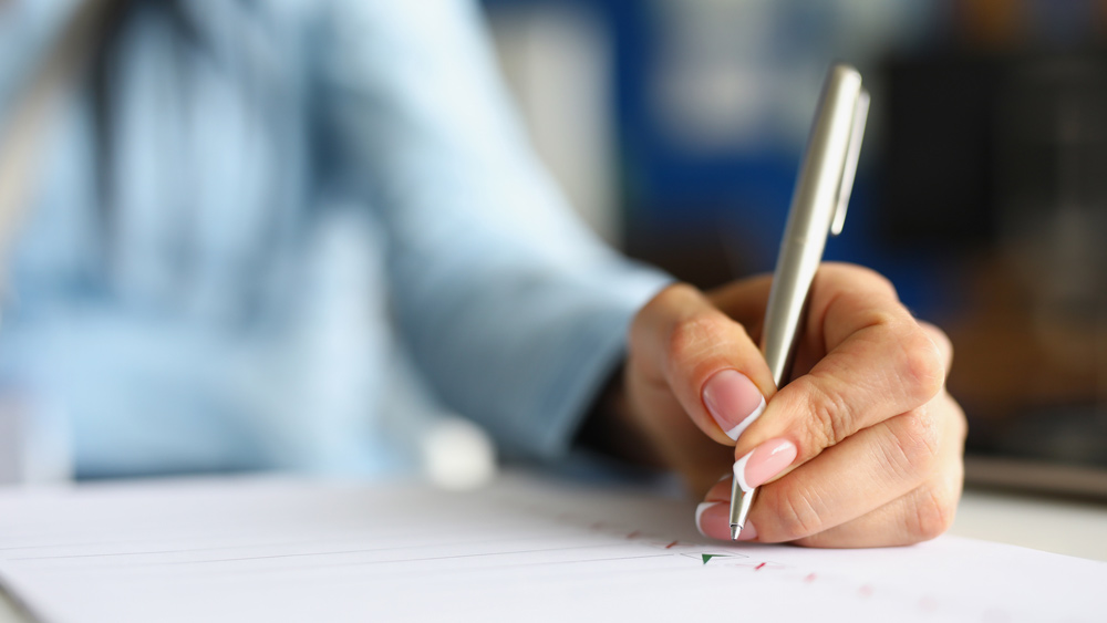 woman completing an assessment