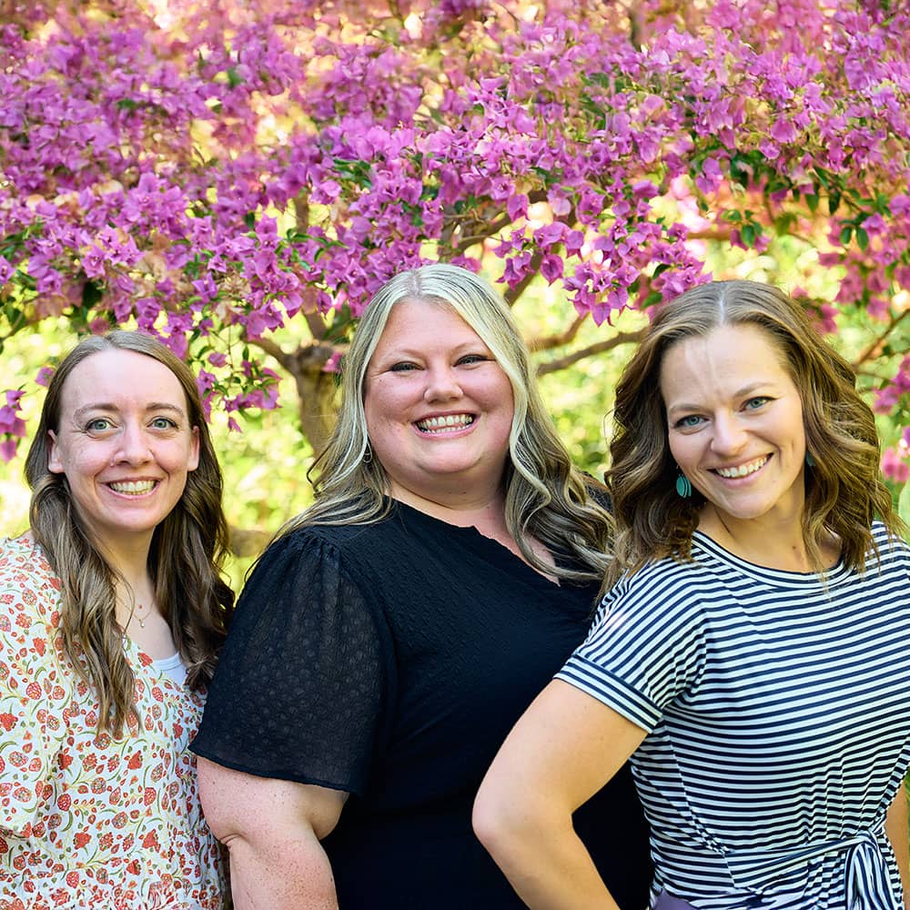 three happy employees